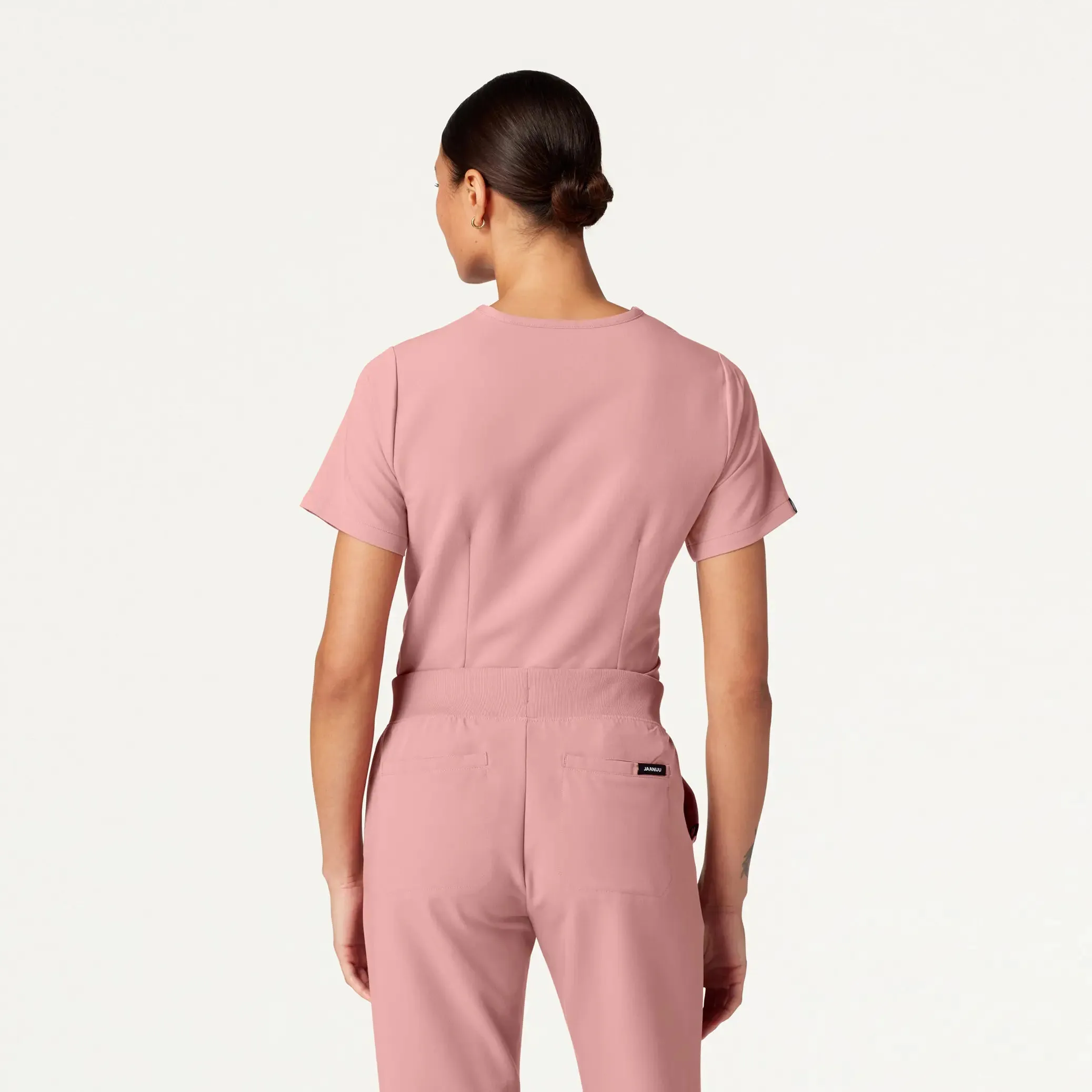 Jaanuu Women's Rhena Essential 1-Pocket Scrub Top - Mauve